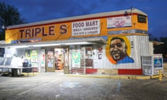 A mural in memory of Alton Sterling outside the Triple S mart. Sterling was shot six times.