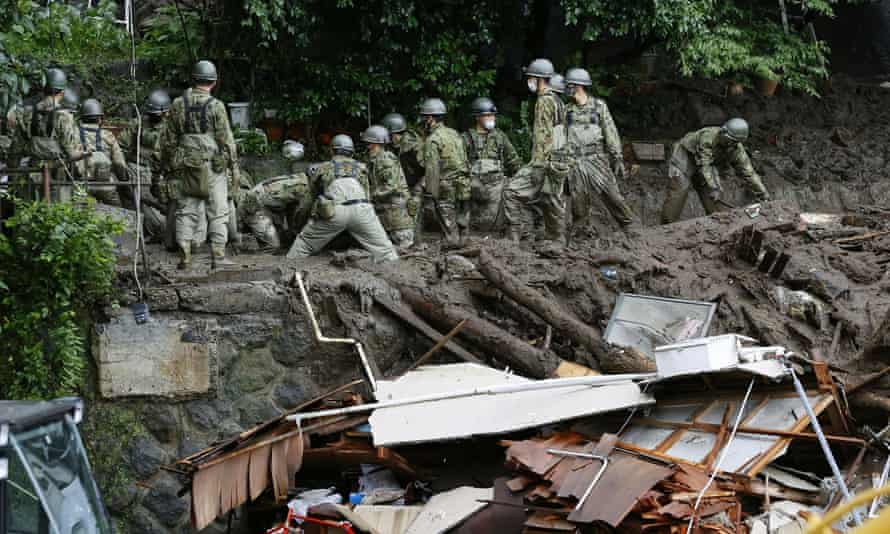 In this photo taken by Kyodo News on July 5, 2021, members of the Japanese Self-Defense Forces conducted rescue and search operations at the site of a mudslide caused by heavy rain in the Atami Izu Mountain area in western Tokyo, Japan. Kyodo/via REUTERS ATTENTION EDITORS-This image is provided by a third party. Mandatory credit. Japan is out.No commercial or editorial sales in Japan