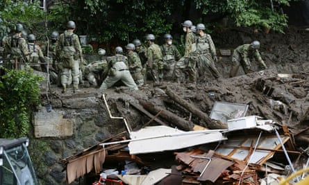 Aftermath of mudslide in AtamiMembers of Japanese Self-Defence Forces conduct rescue and search operartion at a mudslide site caused by heavy rain at Izusan district in Atami, west of Tokyo, Japan July 5, 2021, in this photo taken by Kyodo. Kyodo/via REUTERS ATTENTION EDITORS - THIS IMAGE WAS PROVIDED BY A THIRD PARTY. MANDATORY CREDIT. JAPAN OUT. NO COMMERCIAL OR EDITORIAL SALES IN JAPAN