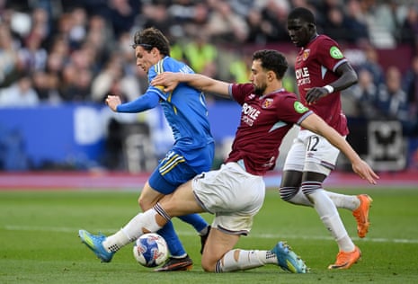 Brenden Aaronson of Leeds United is fouled by Max Kilman of West Ham United resulting in a penalty kick.