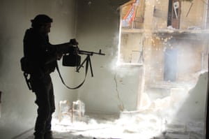 A Free Syrian Army member during a battle in the Sheikh Maksoud district