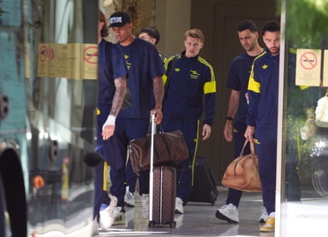Arsenal players leave the team hotel after the Champions League final