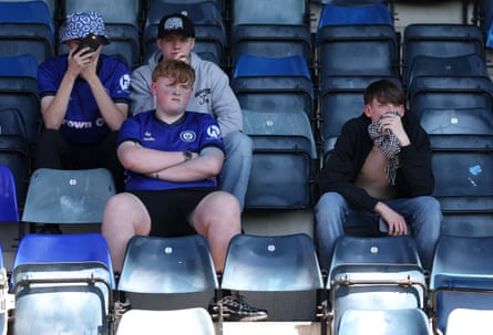 Rochdale fans look dejected at full-time after the draw against York.