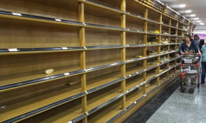 Empty Venezuelan supermarket shelves