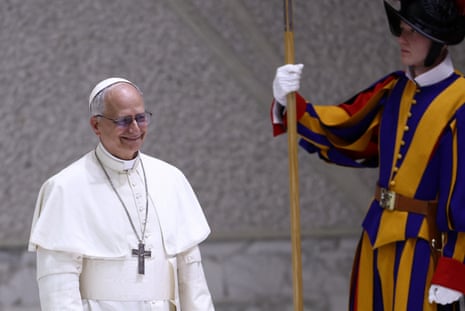 Pope Leo XIV arrives to hold an audience with representatives of the media in Paul VI hall at the Vatican.