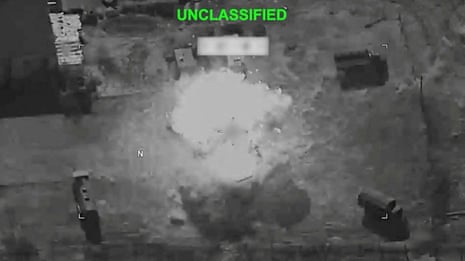 A viewfinder image showing a cloud of smoke from a reported bombing.
