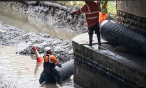 Flood defences are prepared in Mytholmroyd, in the Upper Calder Valley in West Yorkshire.