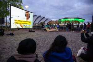 The NGO Global Witness and its partners host a memorial to the 1,005 environmental defenders murdered since the Paris agreement in 2015.