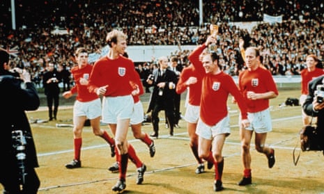 Ray Wilson, with the trophy, performing a lap of honour with the England team at Wembley after winning the World Cup final, 30 July 1966.