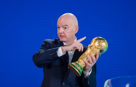 Gianni Infantino holds the World Cup