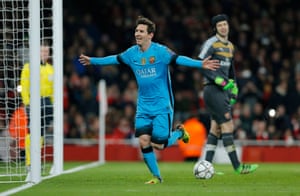 Lionel Messi celebrates scoring his second goal in Barcelona’s win at Arsenal.