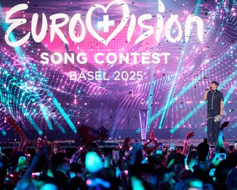 Last year’s Eurovision winner, Austria’s JJ, on stage with the trophy in Switzerland in May 2025.