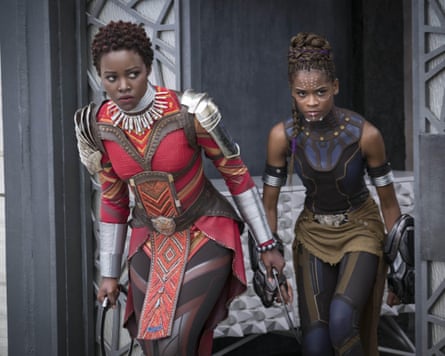 Lupita Nyong’o as Nakia, and Letitia Wright as Shuri in the 2018 film, Black Panther.