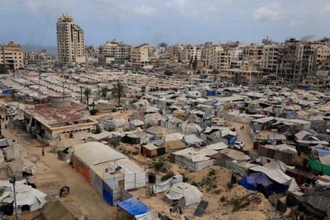 Palestinians, displaced by the Israeli offensive, shelter in tents, amid a hunger crisis, in Gaza City, 1 August 2025.