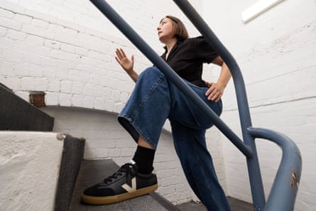 Emma takes the stairs, opting for three at a time