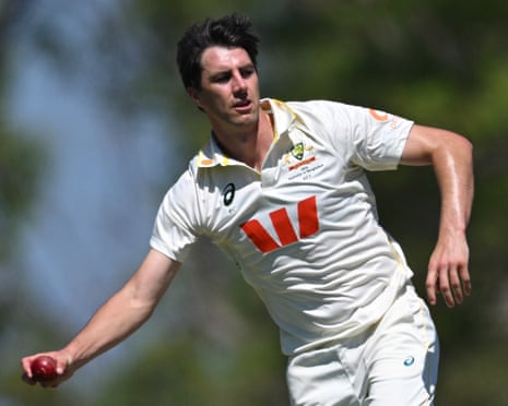 Pat Cummins fields the ball off his own bowling during day two of the first Test between Australia and Bangladesh
