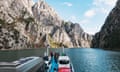 the Komani Lake Ferry navigates a rocky gorge with a payload of people and vehicles, on Lake Koman, Albania<br>2R8W714 the Komani Lake Ferry navigates a rocky gorge with a payload of people and vehicles, on Lake Koman, Albania