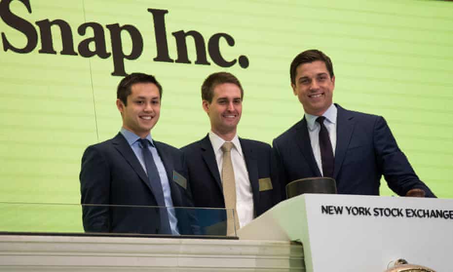 Snapchat co-founders Bobby Murphy and Evan Spiegel, with Thomas Farley, president of the NYSE