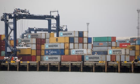 Containers are loaded on to a ship at the port of Felixstowe in Suffolk