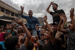 People cheering in the street