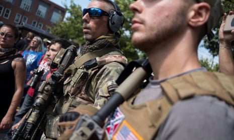 Members of a white supremacist militia stand at the rally in Charlottesville, Virginia.