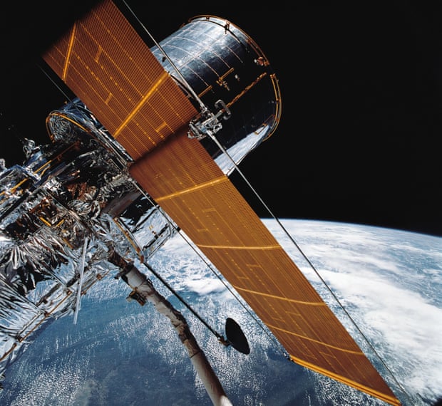 In this 1990 file photo, the giant Hubble Space Telescope can be seen as it is suspended in space 