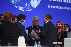India's environment minister, Bhupender Yadav, speaking with the Cop26 president, Alok Sharma