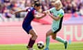 Chelsea's Erin Cuthbert (right) tussles for the ball with Barcelona's Mariona Caldentey.