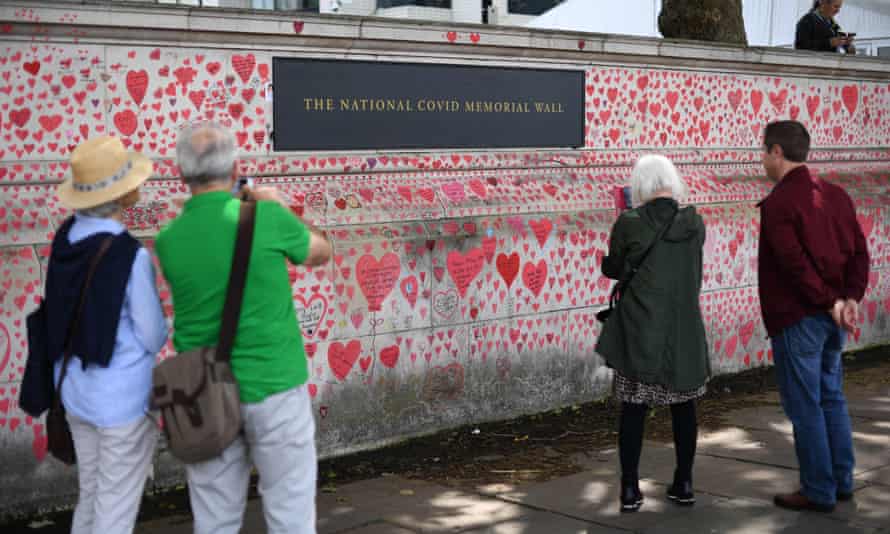 The National Covid Memorial Wall at the embankment on the south side of the River Thames in London