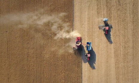 aerial photo of field being harvested
