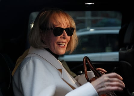 E Jean Carroll smiling successful a car