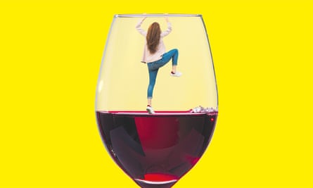 A woman climbs out of a wine glass