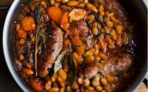 Pork on a fork ... Nigel Slater’s beans and sausage with harissa