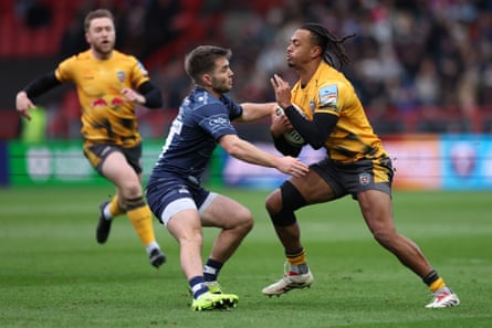 Oli Spencer is challenged by Bristol’s Harry Randall.