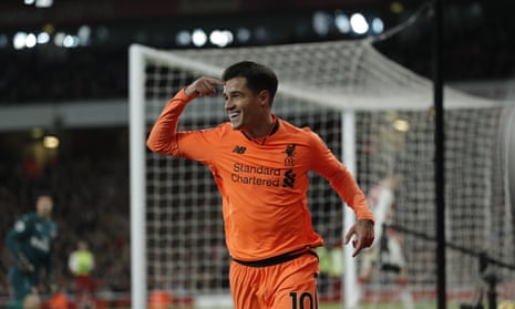 Coutinho celebrates after scoring with his head.