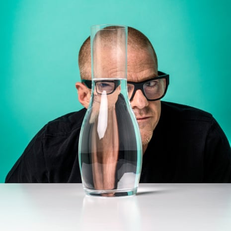 Heston Blumenthal stares through a jug of water