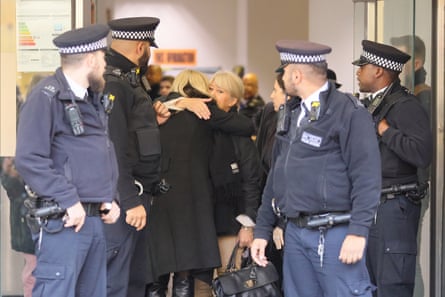 Caroline and Christine hugging outside Highbury Corner Magistrates Court, London, on 23 December 23 2019.