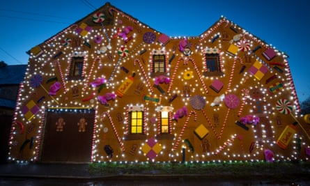 Somerset Pub Transformed Into Gingerbread Inn For ChristmasWELLS, ENGLAND - DECEMBER 13: Lights illuminate the Queen Victoria Inn in the village of Priddy that has been transformed into a giant gingerbread house in time for Christmas, near Wells on December 13, 2017 in Somerset, England. Renamed The Gingerbread Inn, which now features giant candy canes, sherbet, lollipops, liquorice allsorts, gingerbread men and also a giant Christmas tree made up of recycled bottles and has been described by its creator as the world’s largest gingerbread inn. (Photo by Matt Cardy/Getty Images)