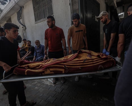 Bodies of Palestinians are brought to al Shifa Hospital after Israeli airstrike at Al-Shati Camp in Gaza Strip on July 11, 2025.