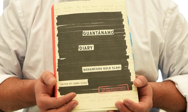 Mohamedou Ould Slahi’s brother Yahdih holds a copy of Guantanamo Diary, which has made the Samuel Johnson prize longlist, at the book’s unveiling earlier this year.