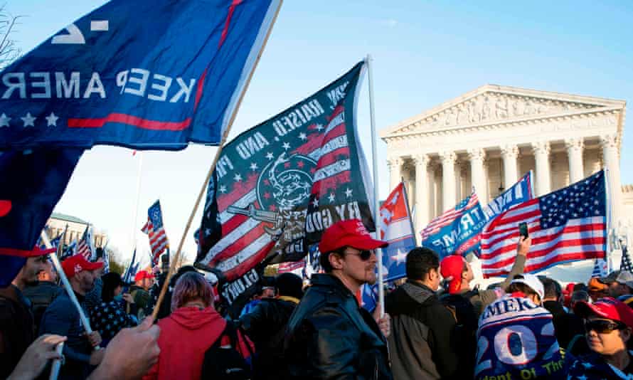 Trump supporters protest the outcome of the election in front of the US supreme court on 12 December 2020 in Washington DC.