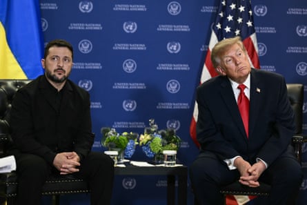 Volodymyr Zelenskyy and Donald Trump sitting and looking away from each other
