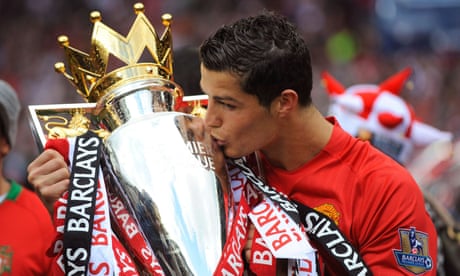 FILE PHOTO: Barclays Premier League - Manchester United v Arsenal<br>FILE PHOTO: Soccer Football - Barclays Premier League - Manchester United v Arsenal - Old Trafford, Manchester, Britain - May 16, 2009 Manchester United’s Cristiano Ronaldo celebrates winning the Premier League with the trophy Action Images via Reuters/Michael Regan/File Photo