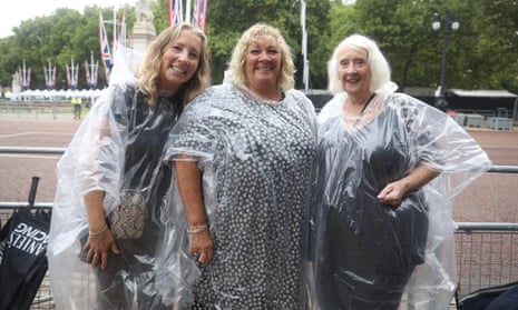 Pictured left to right: Emma Jackson, 47, Joanne Fathers, 57, Sandra Baker, 78 from Orpington wait by Buckingham Palace in central London for the Queen’s coffin to arrive at Buckingham Palace.