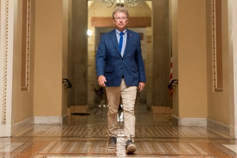 Rand Paul walks to the Senate floor as Republican lawmakers struggle to pass Trump’s sweeping spending and tax bill.