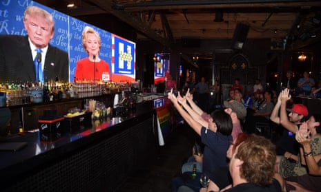 Clinton supporters react to a statement by Donald Trump as they watch the first US presidential debate at the Abbey bar in West Hollywood, California Monday.