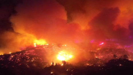 Aerial footage shows Rhodes wildfire turning sky orange – video