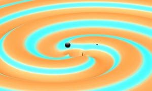 This image depicts two black holes just moments before they collided and merged with each other, releasing energy in the form of gravitational waves. 