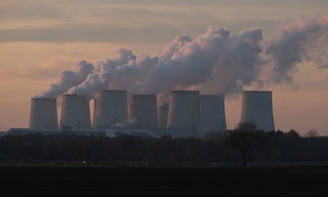 Steam rises from cooling towers at the Jaenschswalde lignite coal-fired power plant on January 15, 2020 near Peitz, Germany. 