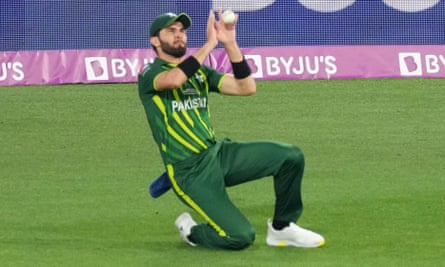Shaheen Afridi takes a catch to dismiss England’s Harry Brook but the Pakistan bowler hurt himself in the process